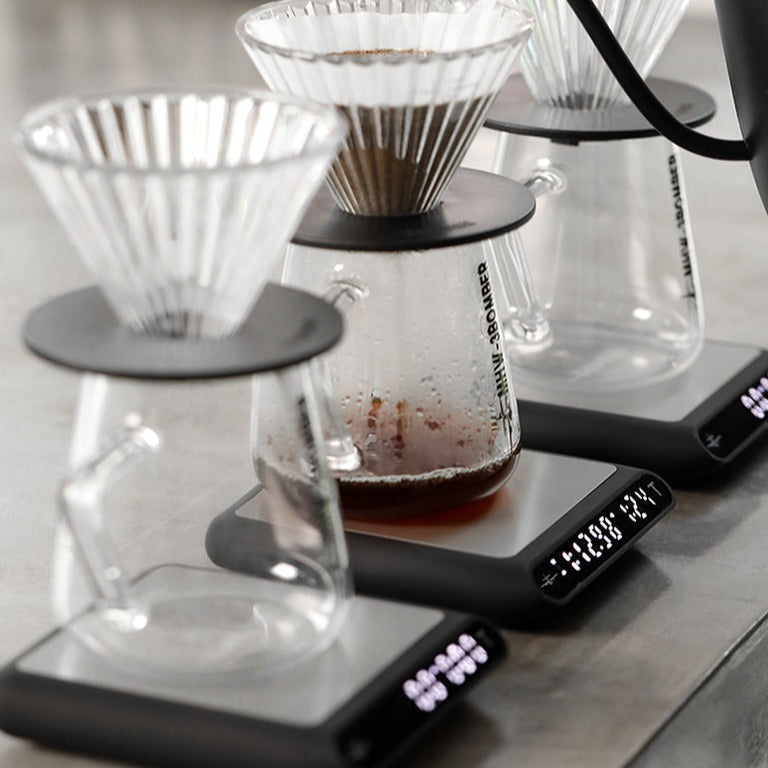 https://jusinhellife.com/cdn/shop/products/MHW-3BOMBER-Smart-Drip-Espresso-Coffee-Scale-with-Auto-Timer-USB-Charging-Kitchen-Electronic-Scale-Cafe-65_1.jpg?v=1673442051&width=1445